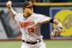 ST. PETERSBURG, FL - OCTOBER 1: Manny Machado #13 of the Baltimore Orioles throws a runner out in the bottom of the second inning of the game against the Tampa Bay Rays at Tropicana Field on October 1, 2017 in St. Petersburg, Florida. (Photo by Joseph Garnett Jr./Getty Images)