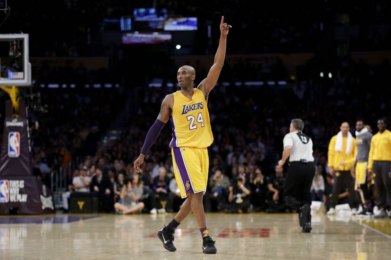 Los Angeles Lakers forward Kobe Bryant gestures during the first half of Bryant's last NBA basketball game, against the Utah Jazz, on Wednesday, April 13, 2016, in Los Angeles. (AP Photo/Jae C. Hong)