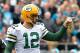 CHARLOTTE, NC - DECEMBER 17: Aaron Rodgers #12 of the Green Bay Packers reacts after a touchdown pass against the Carolina Panthers in the first quarter during their game at Bank of America Stadium on December 17, 2017 in Charlotte, North Carolina. (Photo by Grant Halverson/Getty Images)