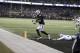 Oakland Raiders wide receiver Michael Crabtree (15) scores a touchdown against the Dallas Cowboys during the second half of an NFL football game in Oakland, Calif., Sunday, Dec. 17, 2017. (AP Photo/Ben Margot)