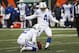 Indianapolis Colts kicker Adam Vinatieri (4) kicks a field goal alongside punter Rigoberto Sanchez (2) in the first half of an NFL football game against the Cincinnati Bengals, Sunday, Oct. 29, 2017, in Cincinnati. (AP Photo/Frank Victores)