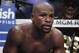 Floyd Mayweather Jr. rests in his corner between rounds in a super welterweight boxing match against Conor McGregor, Saturday, Aug. 26, 2017, in Las Vegas. (AP Photo/Isaac Brekken)