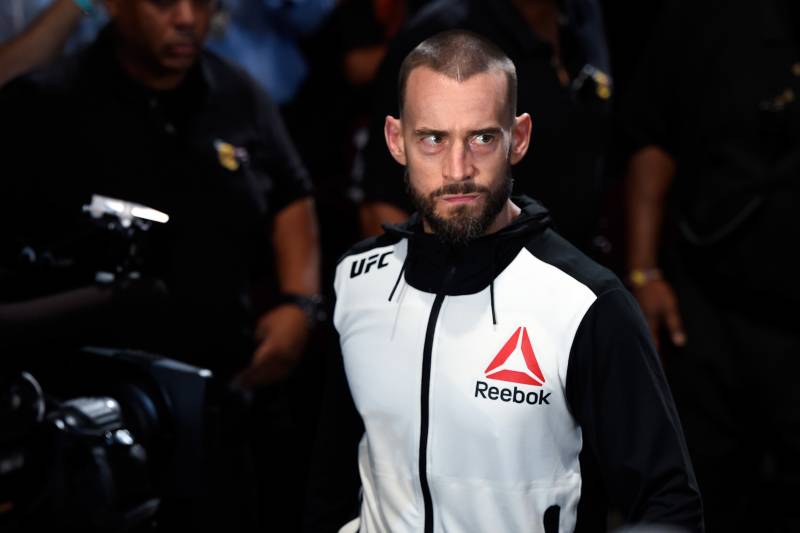 CLEVELAND, OH - SEPTEMBER 10:  Phil 'CM Punk' Brooks enters the arena prior to facing Mickey Gall in their welterweight bout during the UFC 203 event at Quicken Loans Arena on September 10, 2016 in Cleveland, Ohio. (Photo by Josh Hedges/Zuffa LLC/Zuffa LLC via Getty Images)