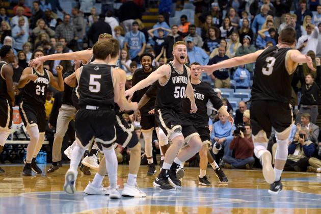 CHAPEL HILL, NC - DECEMBER 20: Matthew Pegram #50 and Fletcher Magee #3 of the Wofford Terriers celebrate with teammates following their win against the North Carolina Tar Heels at Dean Smith Center on December 20, 2017 in Chapel Hill, North Carolina. Wofford won 79-75. (Photo by Lance King/Getty Images)
