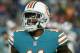 Miami Dolphins wide receiver DeVante Parker (11) leaves the field, during the first half of an NFL football game against the New England Patriots, Monday, Dec. 11, 2017, in Miami Gardens, Fla. (AP Photo/Wilfredo Lee)