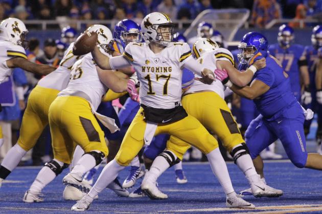 Wyoming quarterback Josh Allen (17) passes the ball during the first half of an NCAA college football game against Boise State in Boise, Idaho, on Saturday, Oct. 21, 2017. (AP Photo/Otto Kitsinger)