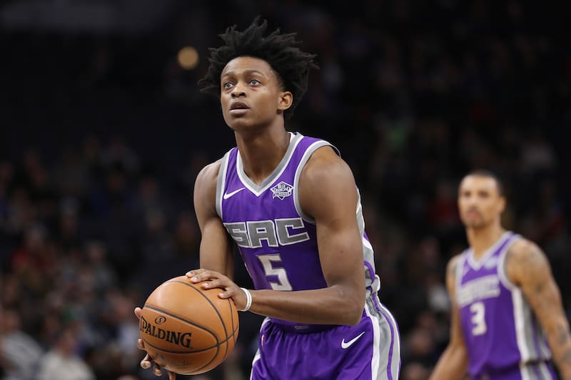 MINNEAPOLIS, MN - DECEMBER 14: De'Aaron Fox #5 of the Sacramento Kings shoots a free throw against the Minnesota Timberwolves on December 14, 2017 at Target Center in Minneapolis, Minnesota. NOTE TO USER: User expressly acknowledges and agrees that, by downloading and or using this Photograph, user is consenting to the terms and conditions of the Getty Images License Agreement. Mandatory Copyright Notice: Copyright 2017 NBAE (Photo by Jordan Johnson/NBAE via Getty Images)