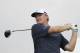 Ernie Els of South Africa tees off on the 7th hole during the SMBC Singapore Open golf tournament at Sentosa Golf Club's Serapong Course on Thursday, Jan. 19, 2017, in Singapore. (AP Photo/Wong Maye-E)
