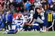 FOXBORO, MA - DECEMBER 24: Micah Hyde #23 of the Buffalo Bills tackles Rob Gronkowski #87 of the New England Patriots during the second half at Gillette Stadium on December 24, 2017 in Foxboro, Massachusetts. (Photo by Maddie Meyer/Getty Images)