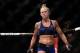 SINGAPORE - JUNE 17: Holly Holm of United States reacts after defeating Bethe Correia of Brazil in the WomenÕs Bantamweight Main Event Bout during UFC Singapore Fight Night at Singapore Indoor Stadium on June 17, 2017 in Singapore. (Photo by Suhaimi Abdullah/Getty Images)