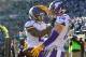 CHARLOTTE, NC - DECEMBER 10: Adam Thielen #19 celebrates with Jerick McKinnon #21 of the Minnesota Vikings after scoring a touchdown against the Carolina Panthers during their game at Bank of America Stadium on December 10, 2017 in Charlotte, North Carolina. (Photo by Grant Halverson/Getty Images)