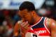 ATLANTA, GA - DECEMBER 27: John Wall #2 of the Washington Wizards wipes his face during the game against the Atlanta Hawks at Philips Arena on December 27, 2017 in Atlanta, Georgia. NOTE TO USER: User expressly acknowledges and agrees that, by downloading and or using this photograph, User is consenting to the terms and conditions of the Getty Images License Agreement. (Photo by Kevin C. Cox/Getty Images)