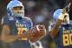 Navy's quarterback Malcolm Perry scores a touchdown against Virginia in the first half of the Military Bowl NCAA college football game, Thursday, Dec. 28, 2017, in Annapolis, Md. (AP Photo/Gail Burton)