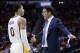 Los Angeles Lakers forward Kyle Kuzma (0) talks with head coach Luke Walton in the second half of an NBA basketball game against the Houston Rockets Wednesday, Dec. 20, 2017, in Houston. (AP Photo/Michael Wyke)