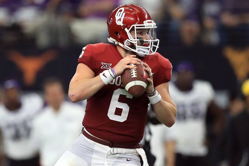 ARLINGTON, TX - DECEMBER 02:  Baker Mayfield #6 of the Oklahoma Sooners looks to pass against the TCU Horned Frogs in the second quarter during Big 12 Championship at AT&T Stadium on December 2, 2017 in Arlington, Texas.  (Photo by Ronald Martinez/Getty Images)