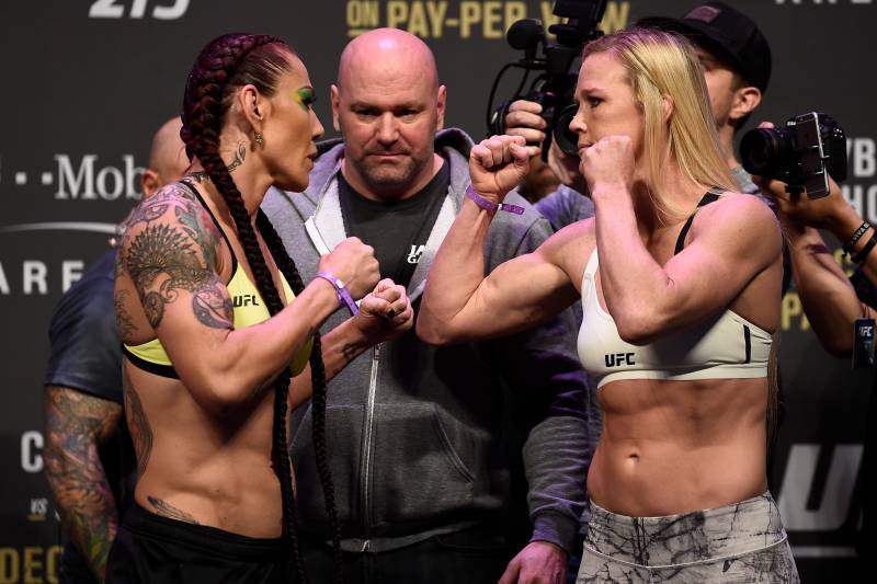 LAS VEGAS, NV - DECEMBER 29: (L-R) Cris Cyborg of Brazil and Holly Holm face off during the UFC 219 weigh-in inside T-Mobile Arena on December 29, 2017 in Las Vegas, Nevada. (Photo by Jeff Bottari/Zuffa LLC/Zuffa LLC via Getty Images)