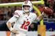 MIAMI GARDENS, FL - DECEMBER 30: Alex Hornibrook #12 of the Wisconsin Badgers passes during the 2017 Capital One Orange Bowl against the Miami Hurricanes at Hard Rock Stadium on December 30, 2017 in Miami Gardens, Florida. (Photo by Mike Ehrmann/Getty Images)