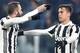 Juventus' Gonzalo Higuain, left, celebrates with his teammate Paulo Dybala after scoring his side's second goal during an Italian Cup round of 16 soccer match between Juventus and Genoa, at Turin's Allians Stadium, Wednesday, Dec. 20, 2017. (Alessandro di Marco/ANSA via AP)