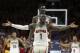 Arizona's Rawle Alkins (1) and Deandre Ayton celebrate during the final seconds of the team's 84-78 victory over No. 3 Arizona State during an NCAA college basketball game Saturday, Dec. 30, 2017, in Tucson, Ariz. (AP Photo/Ralph Freso)