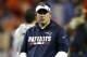 New England Patriots offensive coordinator Josh McDaniels watches warm ups prior to an NFL football game against the Denver Broncos, Sunday, Nov. 12, 2017, in Denver. (AP Photo/David Zalubowski)