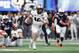ATLANTA, GA - JANUARY 01: McKenzie Milton #10 of the UCF Knights runs on his way to scoring a touchdown in the second quarter against the Auburn Tigers during the Chick-fil-A Peach Bowl at Mercedes-Benz Stadium on January 1, 2018 in Atlanta, Georgia. (Photo by Streeter Lecka/Getty Images)