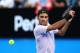 PERTH, AUSTRALIA - JANUARY 02: Roger Federer of Switzerland plays a backhand to Karen Khachanov of Russia in the mens singles match on Day Four of the 2018 Hopman Cup at Perth Arena on January 2, 2018 in Perth, Australia. (Photo by Paul Kane/Getty Images)