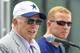 Dallas Cowboys owner Jerry Jones, left, speaks as head coach Jason Garrett looks on during the