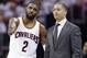 FILE - In this April 20, 2016, file photo, Cleveland Cavaliers' Kyrie Irving, left, talks with head coach Tyronn Lue durng the second half of an NBA basketball playoff game against the Detroit Pistons in Cleveland. With Washington and Boston headed to a Game 7 on Monday, Cleveland's break since sweeping Toronto in the second round just grew a little longer. (AP Photo/Tony Dejak, File)