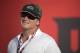 ESPN broadcaster, and former head coach Jon Gruden watches warmups before an NFL preseason football game between the Tampa Bay Buccaneers and the Washington Redskins Thursday, Aug. 31, 2017, in Tampa, Fla. (AP Photo/Phelan M. Ebenhack)