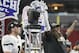Central Florida linebacker Shaquem Griffin, right, and Central Florida quarterback McKenzie Milton (10) celebrate after the Peach Bowl NCAA college football game against Auburn, Monday, Jan. 1, 2018, in Atlanta. Central Florida won 34-27. (AP Photo/John Bazemore)