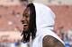Los Angeles Rams running back Todd Gurley smiles on the sidelines before an NFL football game against the San Francisco 49ers Sunday, Dec. 31, 2017, in Los Angeles. (AP Photo/Mark J. Terrill)