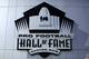 This is the logo of the Pro Football Hall of Fame on the side of the Pro Football Hall of Fame in Canton, Ohio, Friday, Aug. 7, 2015. (AP Photo/Gene J. Puskar)