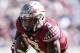 TALLAHASSEE, FL - NOVEMBER 18: Safety Derwin James #3 of the Florida State Seminoles makes an interception for a touchdown during the game against the Delaware State Hornets at Doak Campbell Stadium on Bobby Bowden Field on November 18, 2017 in Tallahassee, Florida. Florida State defeated Delaware State 77 to 6. (Photo by Don Juan Moore/Getty Images)