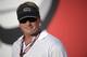 ESPN broadcaster, and former head coach Jon Gruden watches warmups before an NFL preseason football game between the Tampa Bay Buccaneers and the Washington Redskins Thursday, Aug. 31, 2017, in Tampa, Fla. (AP Photo/Phelan M. Ebenhack)