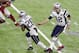 HOUSTON, TX - FEBRUARY 05: James White #28 of the New England Patriots takes the handoff from Tom Brady #12 against the Atlanta Falcons during Super Bowl 51 at NRG Stadium on February 5, 2017 in Houston, Texas. The Patriots defeat the Atlanta Falcons 34-28 in overtime. (Photo by Focus on Sport/Getty Images)