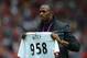 MANCHESTER, ENGLAND - AUGUST 25: Jamaican Athlete Usain Bolt poses with a United shirt prior to the Barclays Premier League match between Manchester United and Fulham at Old Trafford on August 25, 2012 in Manchester, England. (Photo by Shaun Botterill/Getty Images)