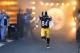 Pittsburgh Steelers wide receiver Antonio Brown (84) is introduced before the start of an NFL football game against the New England Patriots, Sunday, Dec. 17, 2017, in Pittsburgh. (AP Photo/Keith Srakocic)