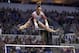 Oklahoma's Maggie Nichols competes on the uneven parallel bars during the NCAA college women's gymnastics championships, Saturday, April 15, 2017, in St. Louis. (AP Photo/Jeff Roberson)