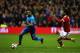 NOTTINGHAM, ENGLAND - JANUARY 07: Theo Walcott of Arsenal beats Armand Traore of Nottingham Forest during the Emirates FA Cup Third Round match between Nottingham Forest and Arsenal at City Ground on January 7, 2018 in Nottingham, England. (Photo by Alex Livesey - Danehouse/Getty Images)