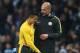 MANCHESTER, ENGLAND - DECEMBER 18: Alexis Sanchez of Arsenal (L) and Josep Guardiola, Manager of Manchester City (R) embrace after the final whistle during the Premier League match between Manchester City and Arsenal at the Etihad Stadium on December 18, 2016 in Manchester, England. (Photo by Clive Brunskill/Getty Images)