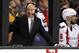 Pierre McGuire broadcasts during the third period of an NHL hockey game between the Boston Bruins and the Washington Capitals n Boston Saturday, April 8, 2017. (AP Photo/Winslow Townson)