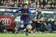 BARCELONA, SPAIN - JANUARY 07: Lionel Andres Messi (L) of FC Barcelona fights for the ball with Ivan Lopez Alvarez, Ivi, of Levante UD during the La Liga match between FC Barcelona and Levante UD at Camp Nou on 07 January 2018 in Barcelona, Spain. (Photo by Power Sport Images/Getty Images)