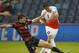 Stanford defender Tomas Hilliard-Arce (4) blocks a kick by Clemson forward Diego Campos (9) in the first half of an NCAA College Cup championship soccer match, Sunday, Dec. 13, 2015, in Kansas City, Kan. (AP Photo/Colin E. Braley)