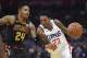 Los Angeles Clippers guard Lou Williams, right, drives by Atlanta Hawks guard Kent Bazemore during the second half of a basketball game, Monday, Jan. 8, 2018, in Los Angeles. The Clippers won 108-107. (AP Photo/Mark J. Terrill)
