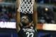Big East's Mitchell Robinson dunks against Big West's during the second half of the McDonald's All- American boys high school basketball game in Chicago, Wednesday, March 29, 2017. Big West won 109-107. (AP Photo/Nam Y. Huh)