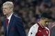 Arsenal's French manager Arsene Wenger (L) reacts as Arsenal's Chilean striker Alexis Sanchez is substituted off of the pitch during the English Premier League football match between Arsenal and West Bromwich Albion at the Emirates Stadium in London on September 25, 2017. / AFP PHOTO / Ian KINGTON / RESTRICTED TO EDITORIAL USE. No use with unauthorized audio, video, data, fixture lists, club/league logos or 'live' services. Online in-match use limited to 75 images, no video emulation. No use in betting, games or single club/league/player publications. / (Photo credit should read IAN KINGTON/AFP/Getty Images)