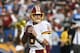 Washington Redskins quarterback Kirk Cousins throws a pass during the first half of an NFL football game against the Los Angeles Chargers Sunday, Dec. 10, 2017, in Carson, Calif. (AP Photo/Denis Poroy)