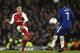 Arsenal's Chilean striker Alexis Sanchez passes the ball during the English League Cup semi-final first leg football match between Chelsea and Arsenal at Stamford Bridge in London on January 10, 2018. / AFP PHOTO / Adrian DENNIS / RESTRICTED TO EDITORIAL USE. No use with unauthorized audio, video, data, fixture lists, club/league logos or 'live' services. Online in-match use limited to 75 images, no video emulation. No use in betting, games or single club/league/player publications. / (Photo credit should read ADRIAN DENNIS/AFP/Getty Images)