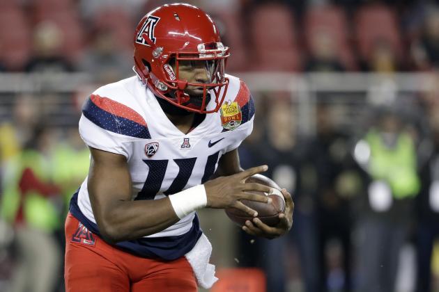 Arizona quarterback Khalil Tate runs against Purdue during the first half of the Foster Farms Bowl NCAA college football game Wednesday, Dec. 27, 2017, in Santa Clara, Calif. (AP Photo/Marcio Jose Sanchez)
