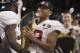 ATLANTA, GA - JANUARY 08: Tua Tagovailoa #13 and Rashaan Evans #32 of the Alabama Crimson Tide celebrates after defeating the Georgia Bulldogs during the College Football Playoff National Championship held at Mercedes-Benz Stadium on January 8, 2018 in Atlanta, Georgia. Alabama defeated Georgia 26-23 for the national title. (Photo by Jamie Schwaberow/Getty Images)